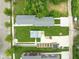 An aerial view showing the home, yard, garden, and driveway at 2427 N Rural St, Indianapolis, IN 46218