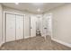 Basement with neutral carpet and a view to a bathroom at 2427 N Rural St, Indianapolis, IN 46218