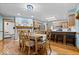 Bright kitchen and dining area with wood floors and an open concept layout at 2818 Locust Dr, Indianapolis, IN 46227