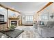 Bright living room with a fireplace, neutral decor, and spacious layout at 2818 Locust Dr, Indianapolis, IN 46227