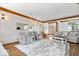 Inviting living room featuring hardwood floors, a cozy seating arrangement, and bright natural light at 2818 Locust Dr, Indianapolis, IN 46227