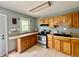Traditional kitchen featuring oak cabinets, stainless steel appliances, and durable countertops for lasting appeal at 2833 Desoto Way, Columbus, IN 47203