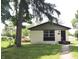 Classic single-story home with painted brick, black trim, and a welcoming front entrance at 3026 Stuart St, Indianapolis, IN 46218