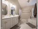 Bathroom with a soaking tub, double sink vanity and modern fixtures at 312 Hawthorne Dr, Pittsboro, IN 46167