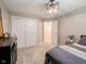 Bedroom with neutral walls and carpet and a closet with sliding doors at 312 Hawthorne Dr, Pittsboro, IN 46167