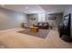 Inviting living room with carpet, a comfortable seating area, and recessed lighting at 312 Hawthorne Dr, Pittsboro, IN 46167