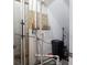 Basement utility room showcases plumbing, water treatment, and essential home systems at 312 Hawthorne Dr, Pittsboro, IN 46167