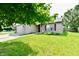 Charming single-Gathering home with a well-maintained lawn and attached two car garage at 3429 Pavetto Ln, Indianapolis, IN 46203