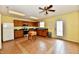 Bright eat-in kitchen with stainless steel appliances, oak cabinets, and tile flooring at 3429 Pavetto Ln, Indianapolis, IN 46203