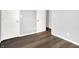 Bedroom with updated dark floors and light grey paint at 4007 Knollwood Ave, Franklin, IN 46131