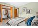 Bright bedroom with walk-in closet and warm decor at 407 Woodland E Dr, Greenfield, IN 46140