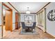 Elegant dining room with natural light, chandelier, and classic decor at 407 Woodland E Dr, Greenfield, IN 46140