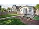 Inviting backyard with a garden, patio and detached garage is a great space for relaxation and social gatherings at 4137 Rookwood Ave, Indianapolis, IN 46208