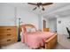 Bedroom featuring a full-size bed, dresser, ceiling fan, neutral decor and carpet at 4137 Rookwood Ave, Indianapolis, IN 46208