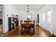 Elegant dining room with hardwood floors, large dining table, and ample natural light at 4137 Rookwood Ave, Indianapolis, IN 46208