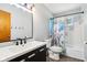 Charming bathroom with decorative shower curtain, and large sink at 418 Dunbar Dr, Indianapolis, IN 46229