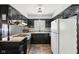 Kitchen featuring black cabinets, stainless appliances, and bright countertop at 418 Dunbar Dr, Indianapolis, IN 46229