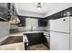 Modern kitchen with white counters, stainless steel appliances, and decorative backsplash at 418 Dunbar Dr, Indianapolis, IN 46229