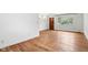 Bright living room with beautiful hardwood flooring and front entry view at 418 Dunbar Dr, Indianapolis, IN 46229