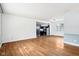 Open living area features hardwood floors and view to kitchen at 418 Dunbar Dr, Indianapolis, IN 46229