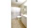 Bathroom featuring a toilet, vanity, and shower with curtain at 430 Heritage Dr, Danville, IN 46122