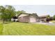 Charming home with a brick facade, manicured lawn, flower beds and an attached garage at 430 Heritage Dr, Danville, IN 46122