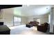 Cozy living room showcasing neutral paint, an area rug, a fireplace and comfortable seating at 430 Heritage Dr, Danville, IN 46122