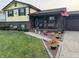 Charming two-story home with brick and siding exterior, landscaped yard, and inviting front porch decor at 4928 Dancer Dr, Indianapolis, IN 46237