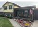 Charming two-story home with brick and siding exterior, landscaped yard, and inviting front porch decor at 4928 Dancer Dr, Indianapolis, IN 46237