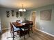 Dining room with modern light fixture and decor at 5010 Melbourne Rd, Indianapolis, IN 46228