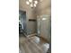 Welcoming foyer with a light-colored wood floor at 5010 Melbourne Rd, Indianapolis, IN 46228