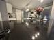 Modern kitchen featuring black countertops, stainless steel appliances, and stylish lighting at 5010 Melbourne Rd, Indianapolis, IN 46228