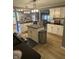 Spacious kitchen with stainless steel appliances and white cabinetry at 5010 Melbourne Rd, Indianapolis, IN 46228