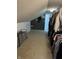 A walk-in closet showing clothing racks, organizers, and lots of storage space at 5010 Melbourne Rd, Indianapolis, IN 46228