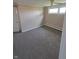 Cozy bedroom with neutral carpet, and trim; ample natural light from two windows at 520 E County Road 500 S, Muncie, IN 47302