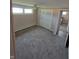Cozy bedroom with neutral carpet, and trim; ample natural light from two windows at 520 E County Road 500 S, Muncie, IN 47302