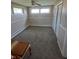 Cozy bedroom with neutral carpet, and trim; ample natural light from two windows at 520 E County Road 500 S, Muncie, IN 47302