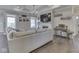 Bright living room with hardwood floors, a fireplace, and a large comfortable sofa at 5755 Victory Dr, Columbus, IN 47203