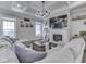 Spacious living room featuring a fireplace, coffered ceiling, and comfortable seating area at 5755 Victory Dr, Columbus, IN 47203