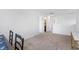 Hallway and gathering space features carpet, white walls and doors leading to other rooms at 5794 Wintersweet Ln, Whitestown, IN 46075