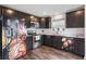 Well-lit kitchen features stainless steel appliances, ample cabinet space, and modern design at 5794 Wintersweet Ln, Whitestown, IN 46075