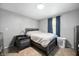 Bedroom showcasing a bed and neutral color scheme with carpeted floor at 614 Belzer Dr, Anderson, IN 46011