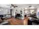 Comfortable living room featuring hardwood floors, ceiling fan, and neutral wall colors at 614 Belzer Dr, Anderson, IN 46011