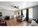 Cozy living room features hardwood floors and a doorway leading to the kitchen at 614 Belzer Dr, Anderson, IN 46011