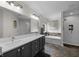 Bathroom with double vanity, soaking tub, and shower featuring subway tile at 6524 Turning Leaf Ln, Indianapolis, IN 46236
