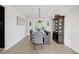 This dining area features a wooden table, chandelier, and custom hutch at 6524 Turning Leaf Ln, Indianapolis, IN 46236