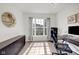 Bright home office with large window, modern desk, and ample storage at 6524 Turning Leaf Ln, Indianapolis, IN 46236