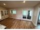 Open dining area featuring wood floors, built-in cabinets, and sliding glass door to the backyard at , Indianapolis, IN 46227