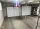 Spacious two car garage with overhead lighting and storage shelving at , Indianapolis, IN 46227