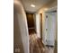 Hallway features wood flooring and multiple access points to other rooms within the home at , Indianapolis, IN 46227